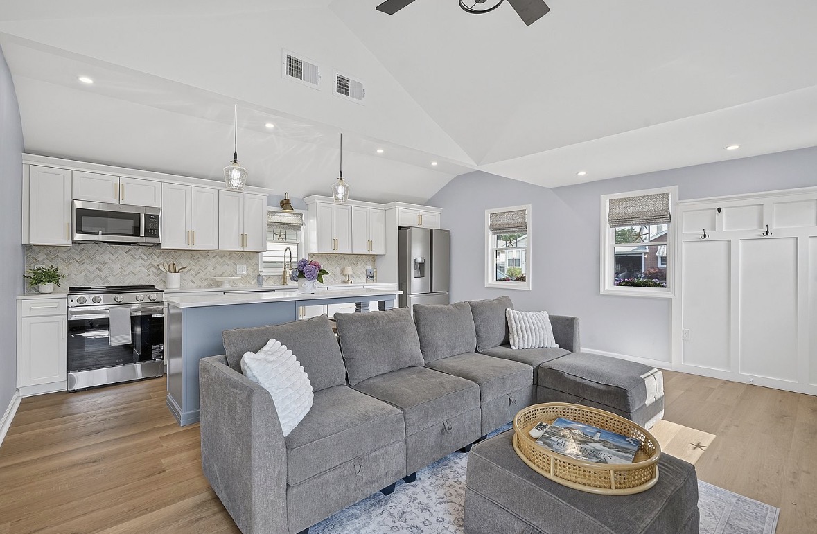 Sectional sofa facing the kitchen island