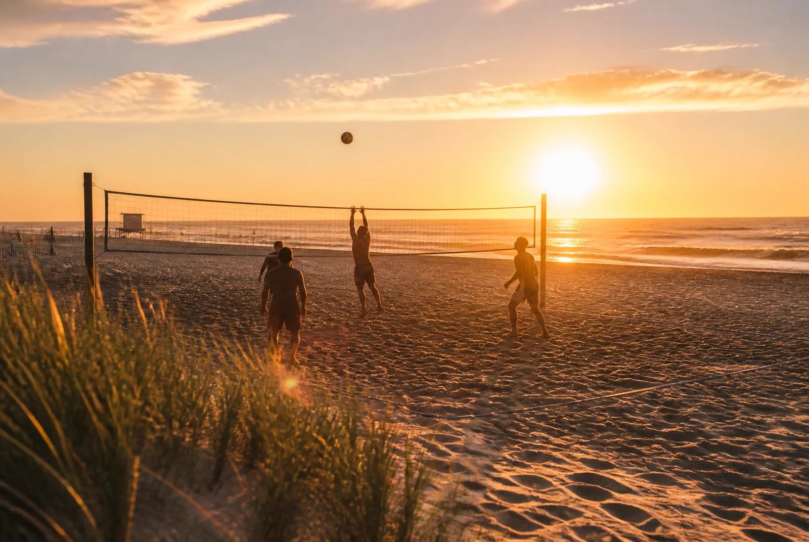 A shore beach with volleyball nets near The Salted Cottage, Spring Lake NJ
