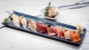 A sushi flight at Spring Lake Seafood in Spring Lake NJ, nigiri arranged from light to dark